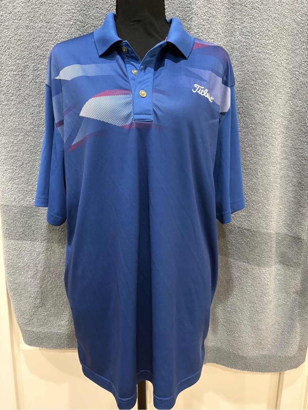 Grand Slam Blue Men’s Golf Polo with Subtle Stripe Accents